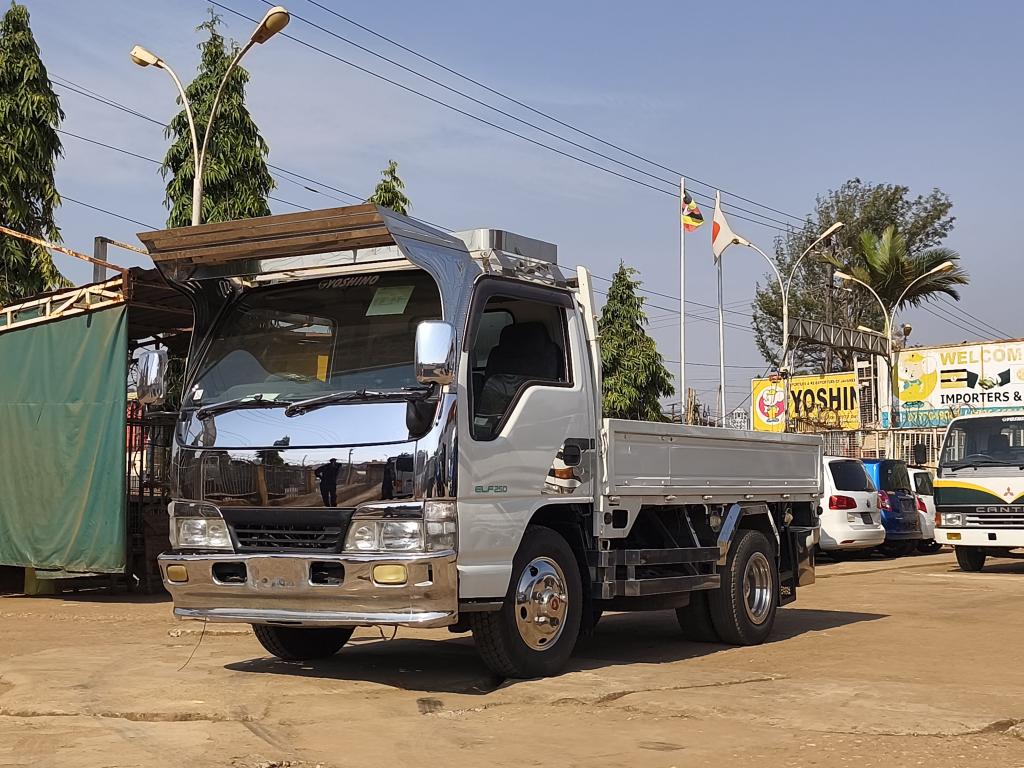 Used March 1998 Isuzu ELF flatbed for sale 03675